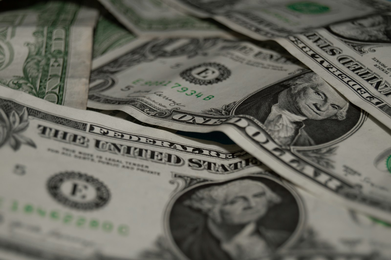 US dollar bills representing a St. Clair County monthly housing budget with property taxes escrowed in