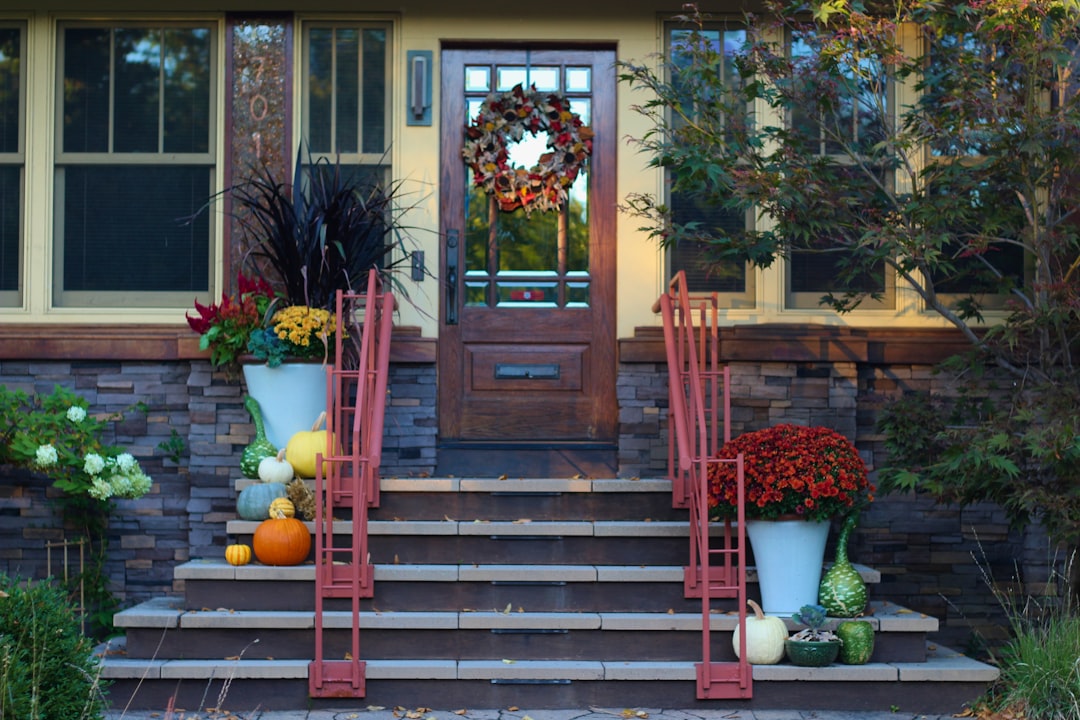 A front porch decorated for autumn on a Metro East home listed in the fall