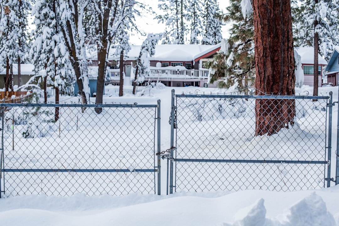A house under snow in winter, when Metro East homes take about ten days longer to sell